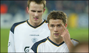 Liverpool's players look for inspiration as they leave the field at half-time