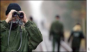 Special police forces examine the railway tracks between Lueneburg and Dannenberg near Hitzacker in northern Germany