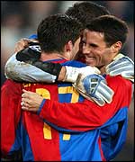 Basle's Mario Cantaluppi (l) celebrates with goalkeeper Pascal Zueberbuhler and Sebastien Barberis 