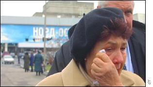 A woman cries near the Moscow theatre