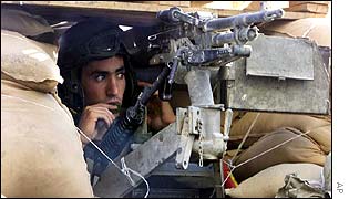 Israeli soldier in armoured personnel carrier in Nablus