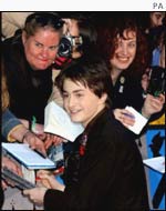Daniel Radcliffe signs autographs at the premiere