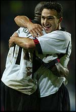 Steed Malbranque celebrates Fulham's winner with scorer Luis Boa Morte