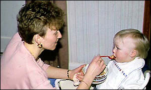 Baby being fed