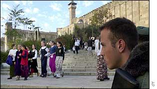 Israeli soldier guards the Tomb of the Patriarchs