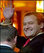 Paul Burrell waves to crowds