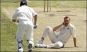 Robert Key sets off on another run as Australia A bowler Stuart Clarke takes time out in Hobart