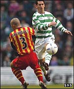 Alan Archibald tackles Celtic's Jackie McNamara