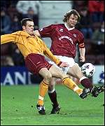 Steven Pressley (right) in action for Hearts