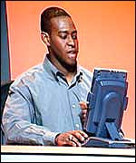 A Microsoft employee working on one of the company's tablet PCs