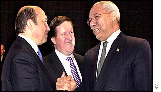 Colin Powell (right), Russian Foreign Minister Igor Ivanov (left), and Nato Secretary General Lord Robertson 