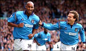 Nicolas Anelka celebrates after scoring a goal for Manchester City