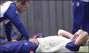 Andrew Flintoff receives treatment from physio Kirk Russell