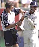 Wayne Morton treats Alec Stewart