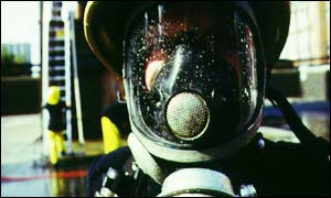 Firefighter with breathing mask