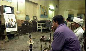 Iraqis watch TV set