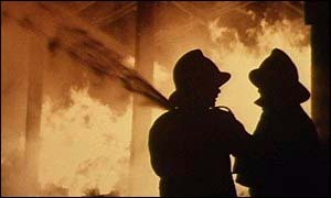 Firemen tackle flames