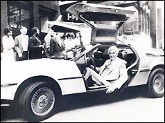 John DeLorean in the DMC-12 produced by his company