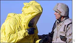 Czech soldier in protective suit with US officer