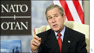 US President George W Bush speaks before the Nato summit