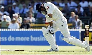 Vaughan is hit on the shoulder ducking into a delivery from Jason Gillespie