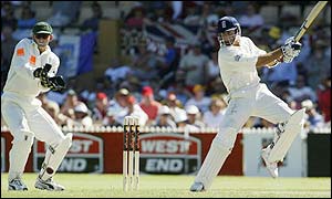 Australian wicket-keeper Adam Gilchrist looks on as Vaughan continues to punish the Australian attack
