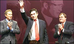 Chancellor Gordon Brown flanked by Prime Minister Tony Blair and Deputy John Prescott