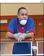 An Amsterdam crew member takes a break from cleaning