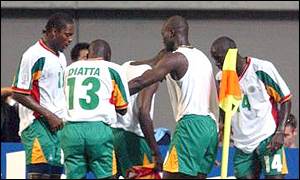 Senegal celebrate scoring against France during the 2002 World Cup