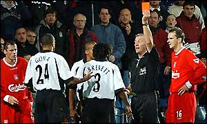 Alain Goma receives his red card