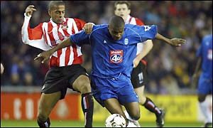 Clinton Morrison holds off Sunderland defender Phil Babb