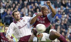 Dion Dublin challenges Christian Daley of West Ham