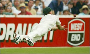 Glenn McGrath pulls off a stunning catch to remove Michael Vaughan for 41