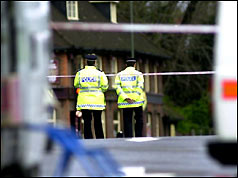 Police search the area round Hendon sorting office - April 2001