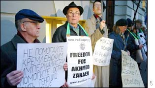 Activists hold pro-Chechen slogans as they picket outside the Danish Embassy in Moscow
