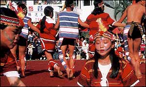 A group of aborigines performing for tourists, Taiwan