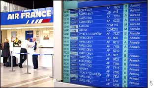 A terminal screen in Nice airport displays the flights cancelled