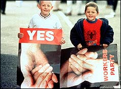 Two boys hold referendum posters in 1998