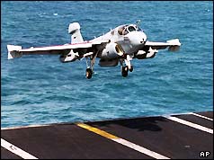 An EA-6B Prowler lands aboard the aircraft carrier USS Nimitz in the Persian Gulf , Jan 1998 
