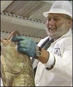 Franz Fischler with cod in hand