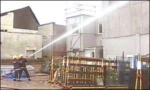 Firefighters at the AGS factory