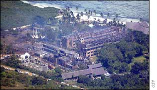 Aerial view of smouldering hotel buildings