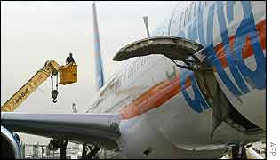 Arkia charter airliner being checked for damage after the missile-attack