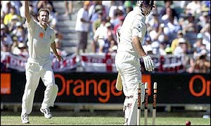 Damien Martyn celebrates taking the wicket of Robert Key 