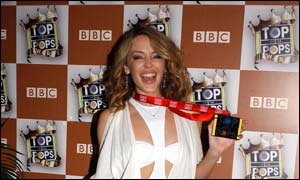 Kylie Minogue with the Top Tour trophy