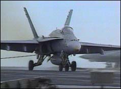 F18 Hornet aircraft landing on the aircraft carrier USS Kitty Hawk 
