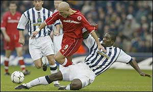 West Brom defender Darren Moore tackles Middlesbrough striker Massimo Maccarone 