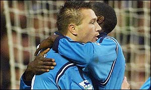 Steve Howey receives a hug from Shaun Goater after his opening goal