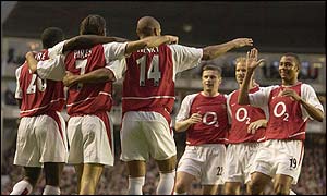 Thierry Henry celebrates with his Arsenal team-mates