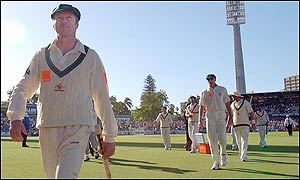 Steve Waugh leads the victorious Australia team off the field after clinching the third Test and the Ashes